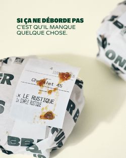 Emballage de burger rogné avec une commande de burgers à Bioburger Orléans Châtelet sur un fond clair.